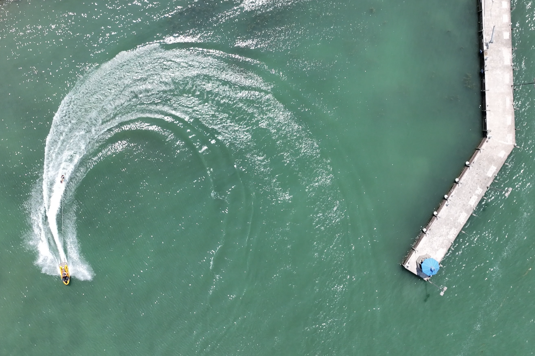 Aerial view of boat circling
