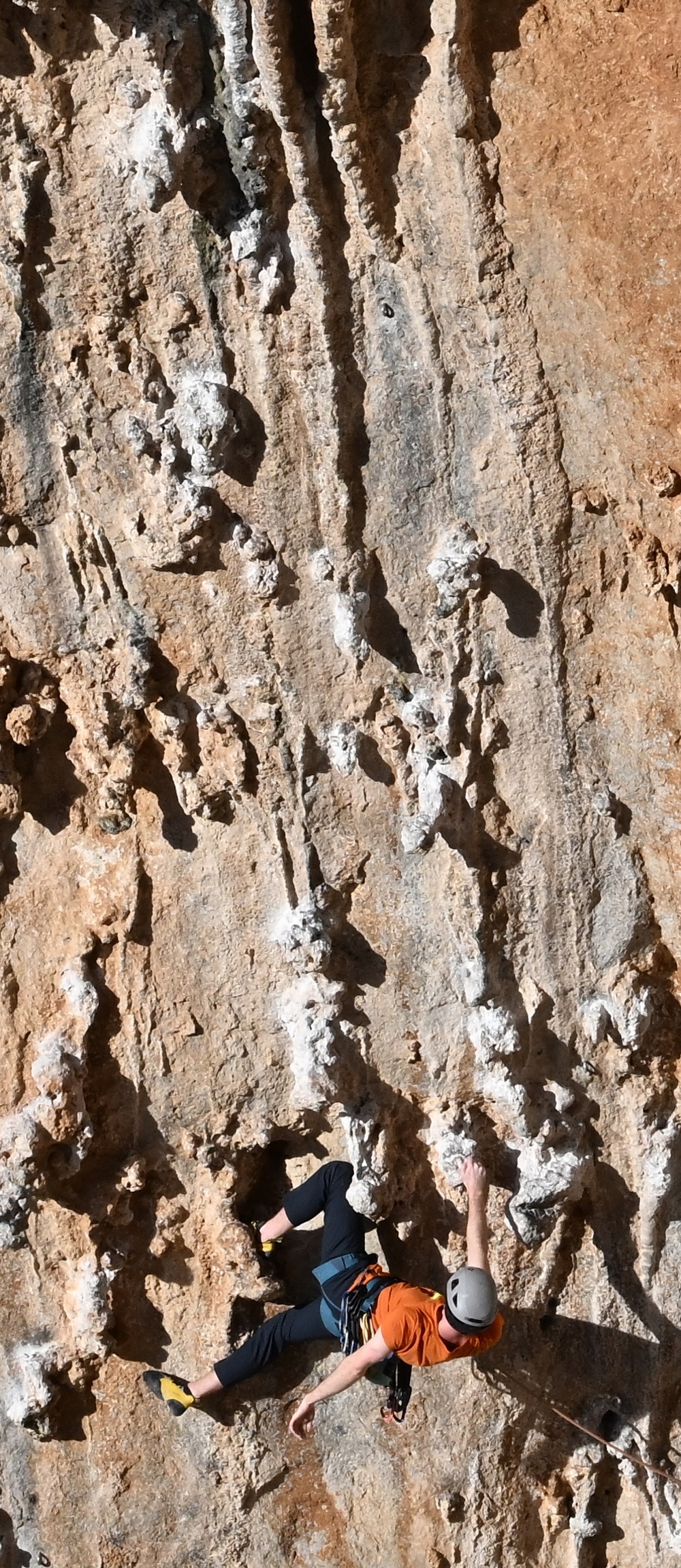 Photo of a person rock climbing outdoors